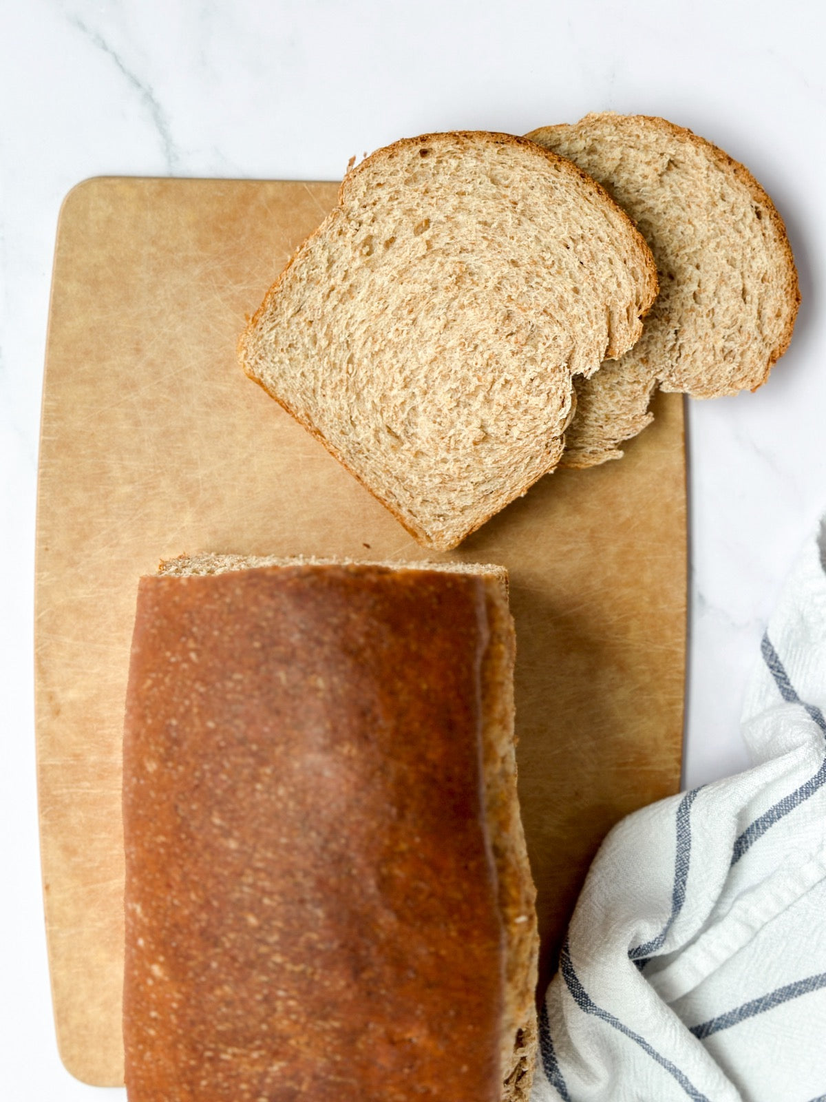 2 slices of honey whole wheat bread cut from the loaf.