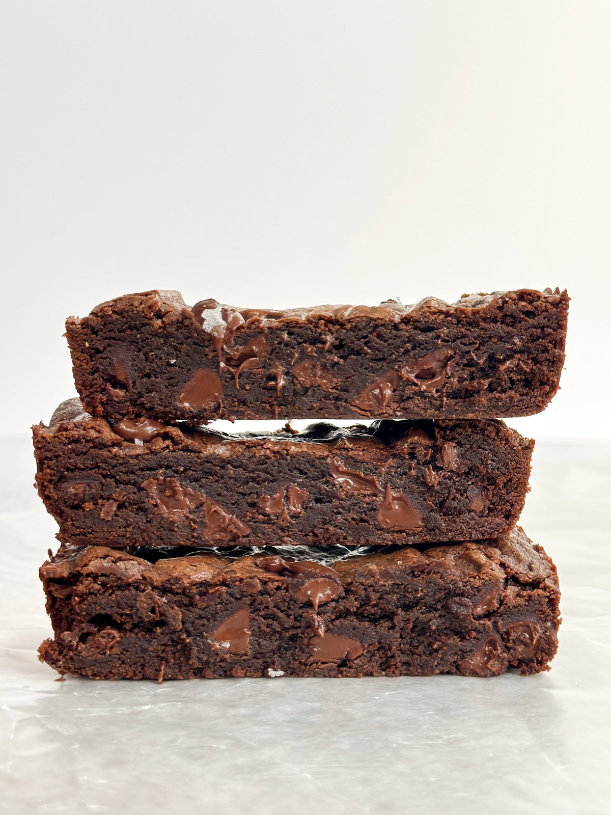 3 brownies stacked on top of each other.